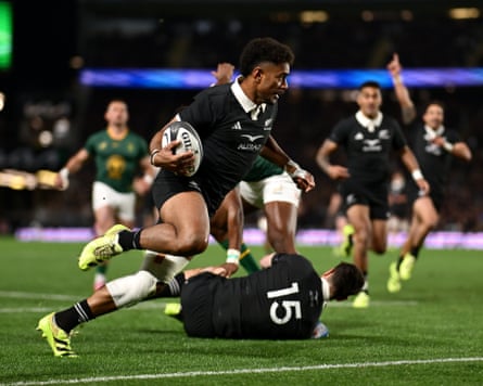 New Zealand’s Emoni Narawa charges towards the tryline