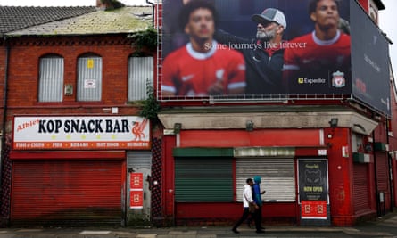A billboard outside Anfield before Klopp’s final match as Liverpool manager, Liverpool on 16 May.