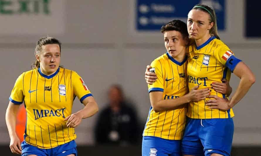 Birmingham City's Harriet Scott (left), Sarah Ewens (center) and Louise Quinn appear dejected after their defeat which confirmed the club's relegation from the WSL.