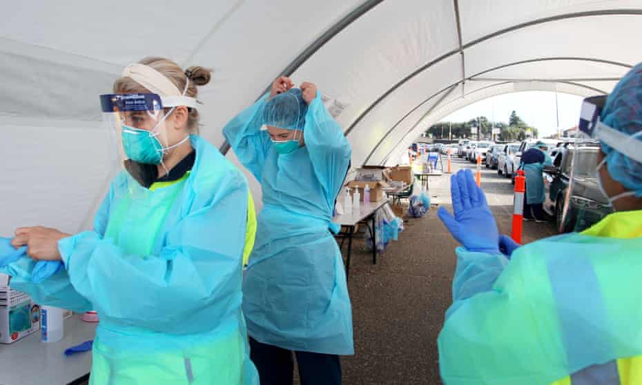 Nurses at a Covid-19 drive-through testing clinic at Bondi Beach in July
