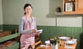 Portrait of waitress preparing table in restaurant<br>GettyImages-157284390