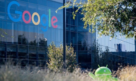 The Google logo and an Android statue are seen at the Googleplex in Mountain View, California. 