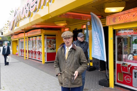 Nigel Farage outside an amusements arcade