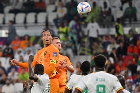 Liverpool's Virgil Van Dijk is unable to get a header on target.