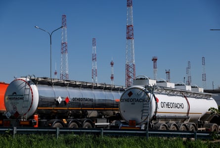 Petrol trucks lined up at a production facility in Russia.