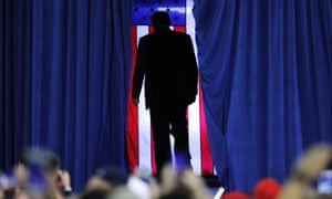 Donald Trump exits after speaking at a campaign rally in Lake Charles, Louisiana on Friday.