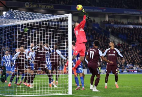 Aston Villa keeper Marco Bizot fails to make contact with the ball which Jan Paul van Hecke eventually pops into the net to give Brighton the lead.