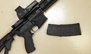 A semi-automatic hunting rifle with a high-capacity detachable magazine is displayed at a gun store in Rocklin, California.