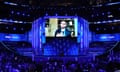 Golden State Warriors star Stephen Curry is seen on a monitor speaking on the final night of the Democratic National Convention at the United Center in Chicago on Thursday.