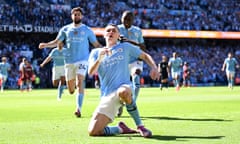 Phil Foden of Manchester City celebrates scoring his team's first goal.
