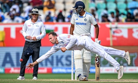 England’s Tom Hartley dives to field the ball during the second Test against India