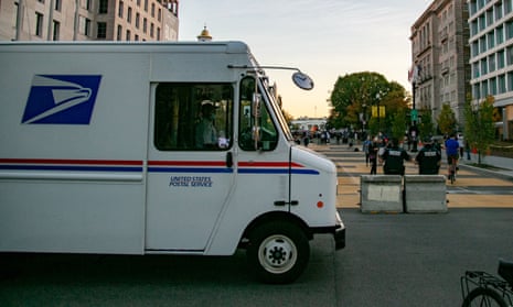 A US Postal Service vehicle passes the White House, three days after election day.