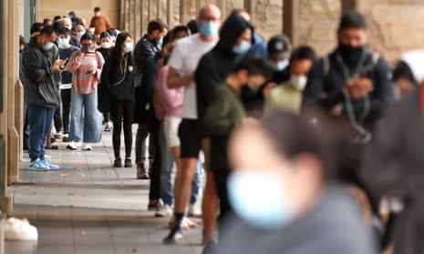 Members of the public queue to take Covid tests in Sydney’s CBD