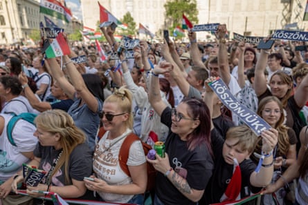 A crowd of happy-looking supporters