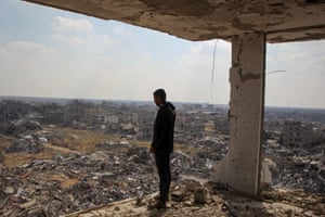 Rafah, Gaza StripA Palestinian man views the rubble of buildings destroyed during the Israeli offensive
