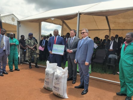 Malawi’s minister of agriculture Samuel Kawale, left, accepts the fertiliser donation from Russia