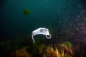 A face mask floats in the water off the coast of Beylikduzu district of Istanbul, Turkey