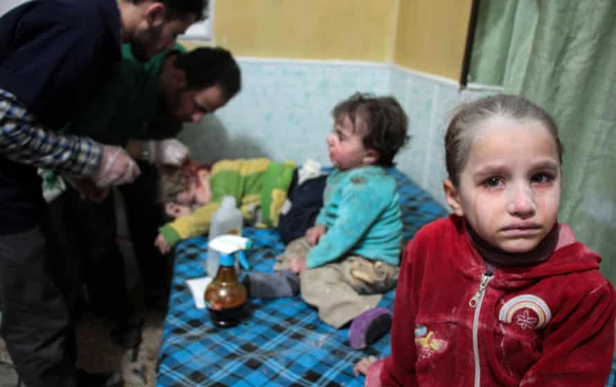 Children injured in reported shelling by Syrian government forces are seen in a makeshift clinic in Syria’s eastern Ghouta region.