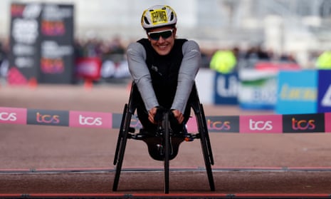 Catherine Debrunner finishes first in the elite women’s wheelchair race