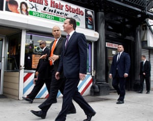 Cory Booker walks through downtown Newark with David Cameron, then British prime minister, in March 2012.