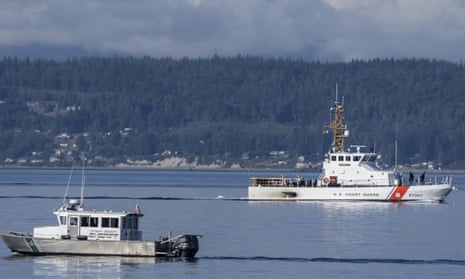 Teams search the area near Freeland, Washington, on Whidbey Island, north of Seattle.