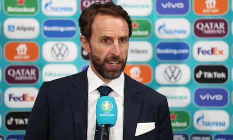England’s manager, Gareth Southgate, gives a TV interview after the Euro 2020 semi-final win over Denmark
