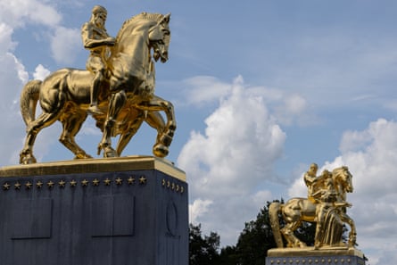 Newly covered in gold leaf … the Arts of War statues.