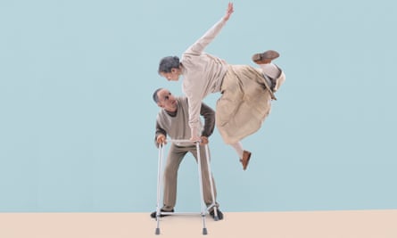 An 'elderly' man crouching on a zimmer frame with an 'elderly' woman leaning on it to leap up and over him