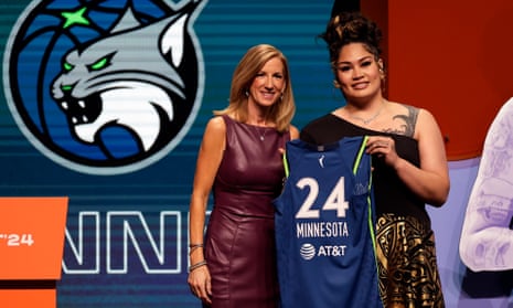 Alissa Pili poses for a photo with the WNBA commissioner Cathy Engelbert after being selected eighth overall by the Minnesota Lynx