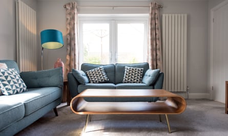 A sitting room with vintage sofas and coffee table