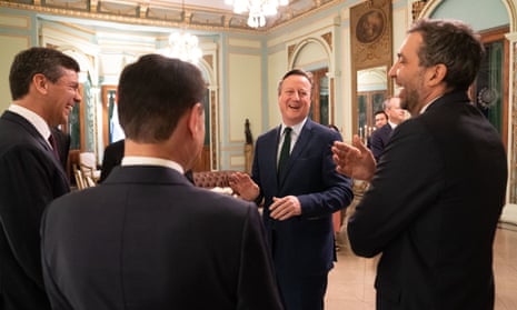The UK foreign secretary, Lord David Cameron (centre), meets Paraguay president, Santiago Pena (far left), at the Palacio Lopez in Asuncion during his visit on 20 February.