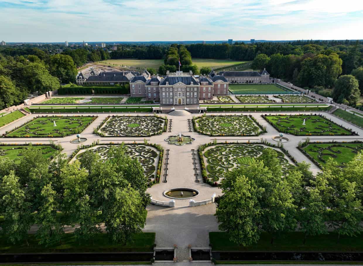 Aerial view of Paleis Het Loo palace with symmetrical formal gardens, fountains and manicured hedges