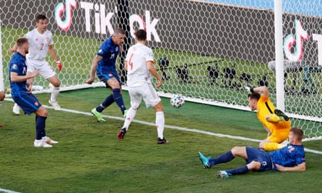Slovakia’s Juraj Kucka scores an own goal.