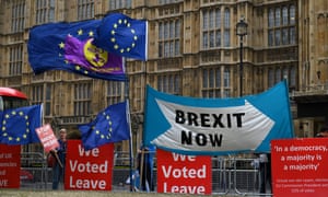 Pro and anti-Brexit banners outside the Houses of Parliament