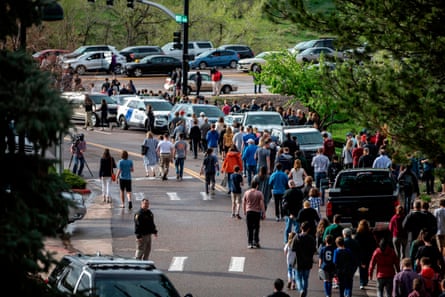 Students being evacuated after the shooting in early May.