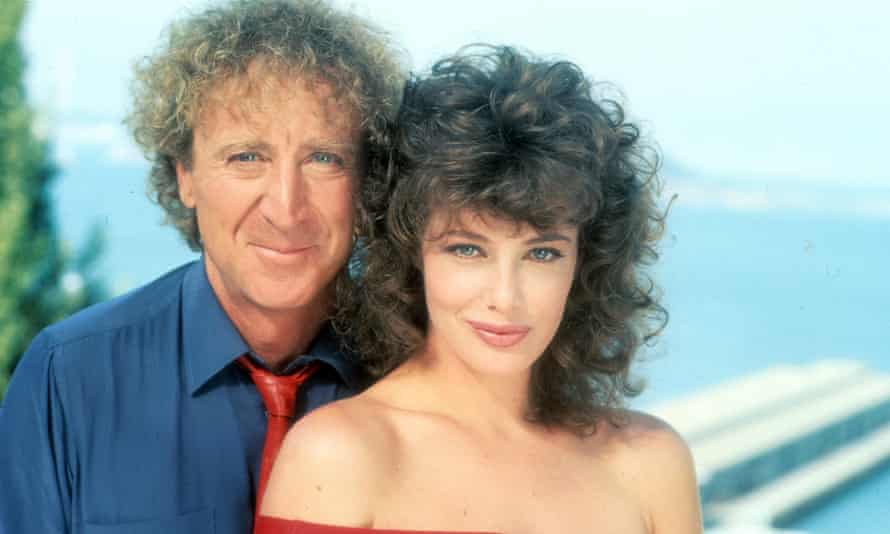 Gene Wilder and Kelly Le Brock in a publicity portrait for The Woman in Red, 1984.