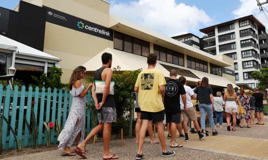long queue of people outside a centrelink office
