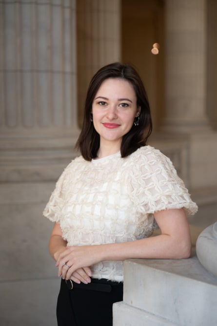 A portrait of a woman wearing a cream blouse at the US Capitol