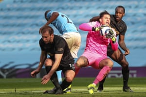 City keeper Ederson claims the ball under pressure from the Hammers’ Craig Dawson and Michail Antonio.