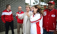 Julie Bishop with members of various sports clubs during a visit and funding announcement at Penshurst Park in Sydney.