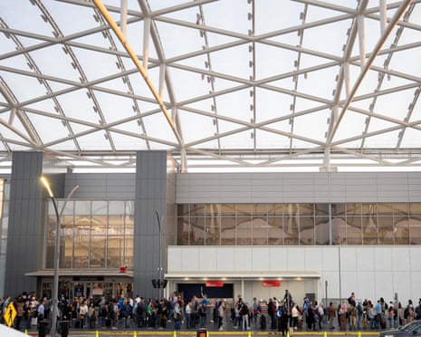 The lines at Atlanta aiport snake outside the terminal building.