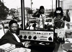 Skipper Lee Frazier, KCOH disc dockey, and go-gogirls, Houston, Texas, 1965Benny Joseph