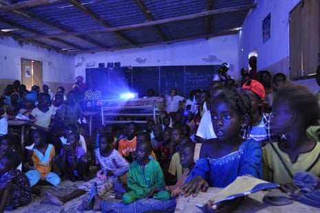 Students in Mboro, Senegal, watching a film shown by Cinemovel at school in 2012.