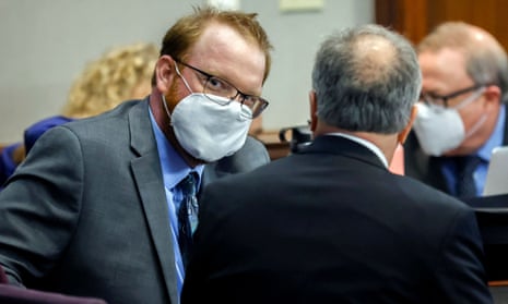 Travis McMichael, left, speaks with his attorney during the sentencing in Brunswick, Georgia, on 7 January. 