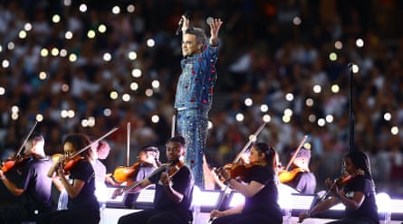 Robbie Williams performs Angels at a Soccer Aid for Unicef event at the London Stadium in June.