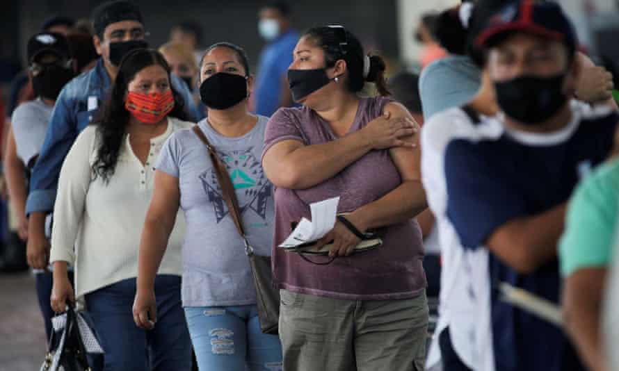 People receiving a dose of AstraZeneca vaccine during a mass vaccination in Monterrey, Mexico in July