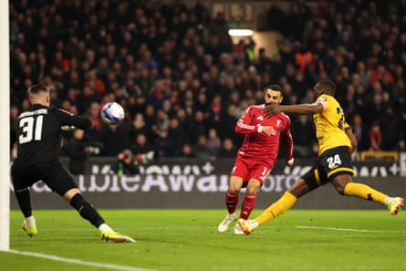 Mohamed Salah tucks away Liverpool’s second goal