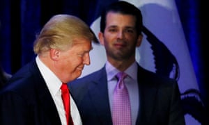 Donald Trump Jr watches his father leave the stage on the night of 2016 Iowa caucus, in Des Moines.