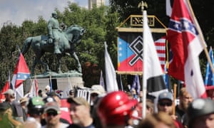 The statue of Confederate General Robert E. Lee stands behind a crowd of hundreds of white nationalists in Charlottesville.