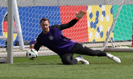 Manuel Neuer makes a save in training